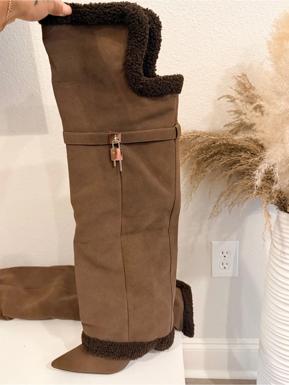 Brown suede knee-high boots with faux fur trim
